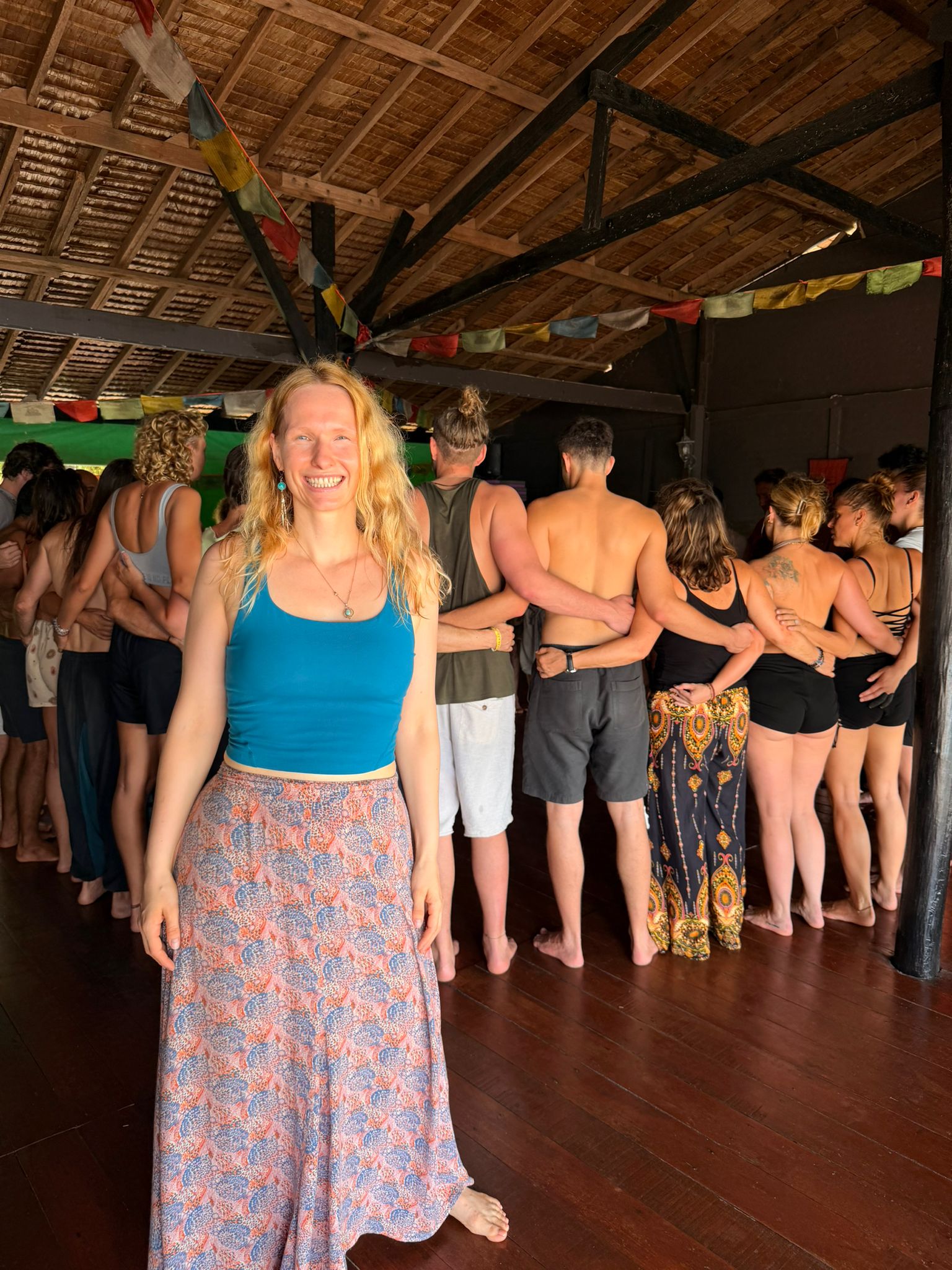 Lisa Ingrid facilitating a BioDevelopment gathering, with participants connected in the background