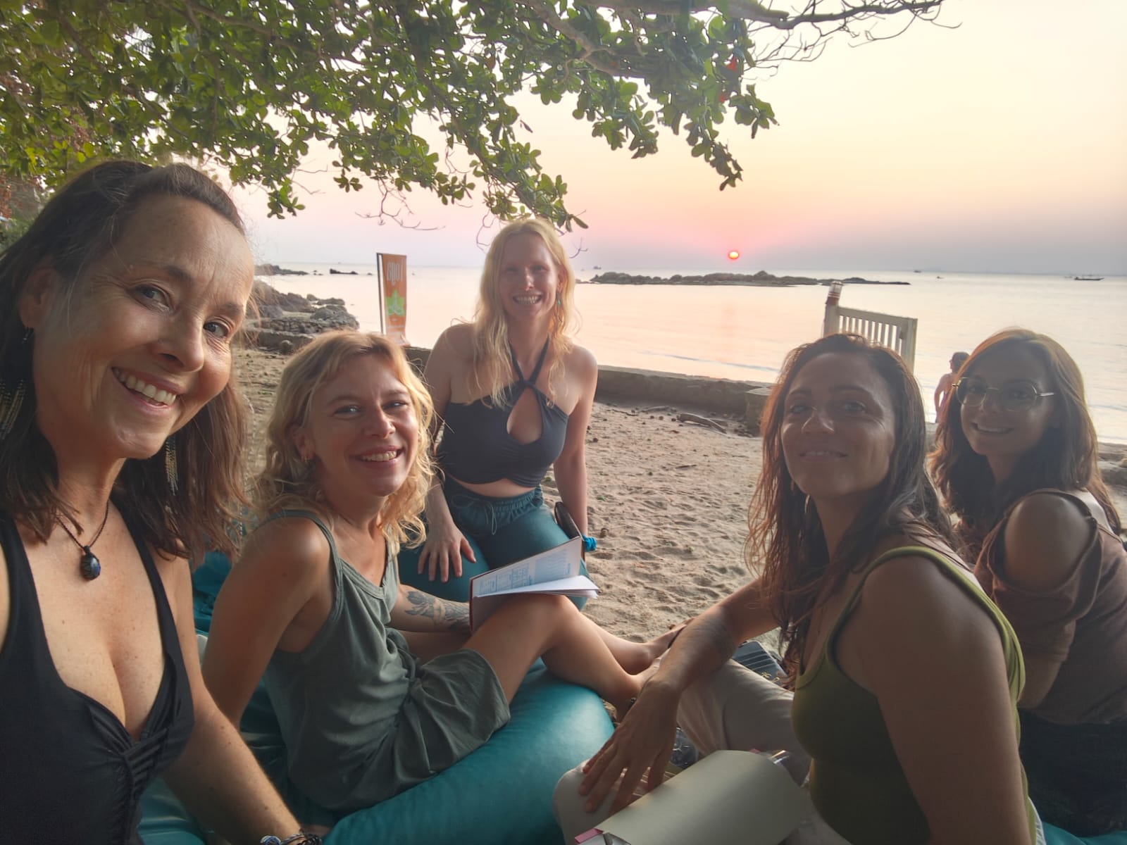 Beach sunset community gathering